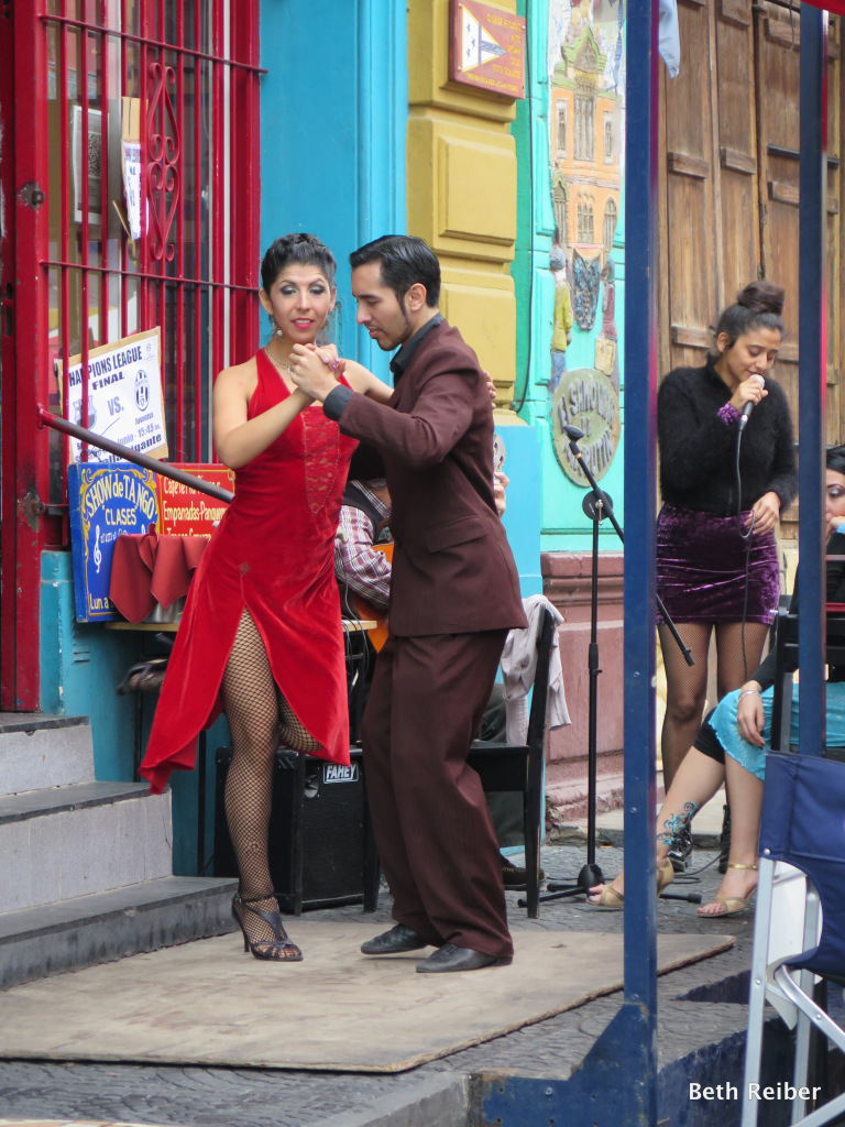 Tango dancers entertain at an outdoor restaurant in La Boca, making Buenos Aires like a European city with a Latin Beat