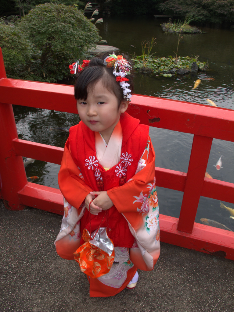 Young girl in New Otani Hotel's garden