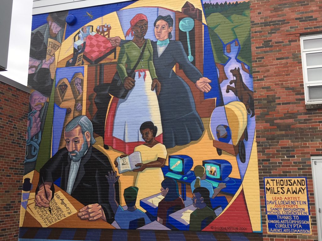 A mural depicting Lawrence Kansas history at Cordley Elementary School