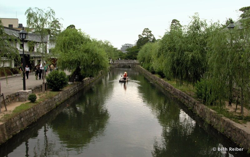 Kurashiki's willow-fringed canal is in the heart of the old warehouse district, one of several places to visit between Kyoto and Hiroshima