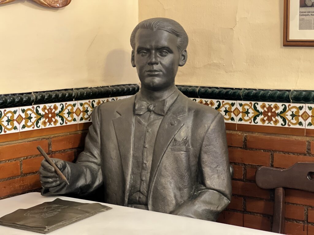 Garcia Lorca in Granada includes this statue in Restaurante Chikito